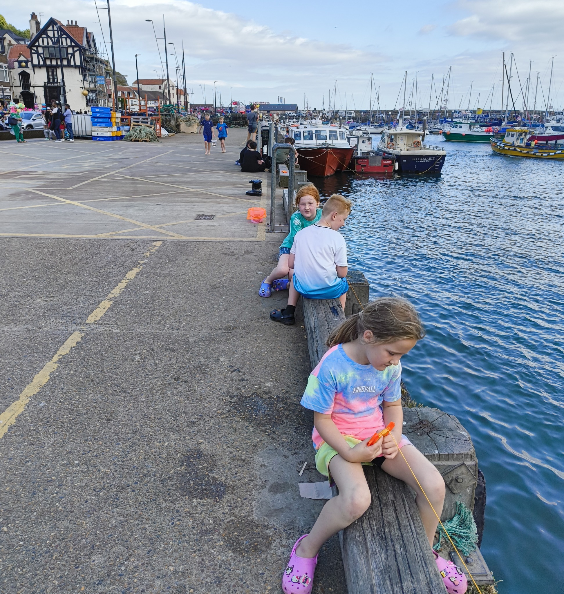 Children crabbing at Scarborough harbour
